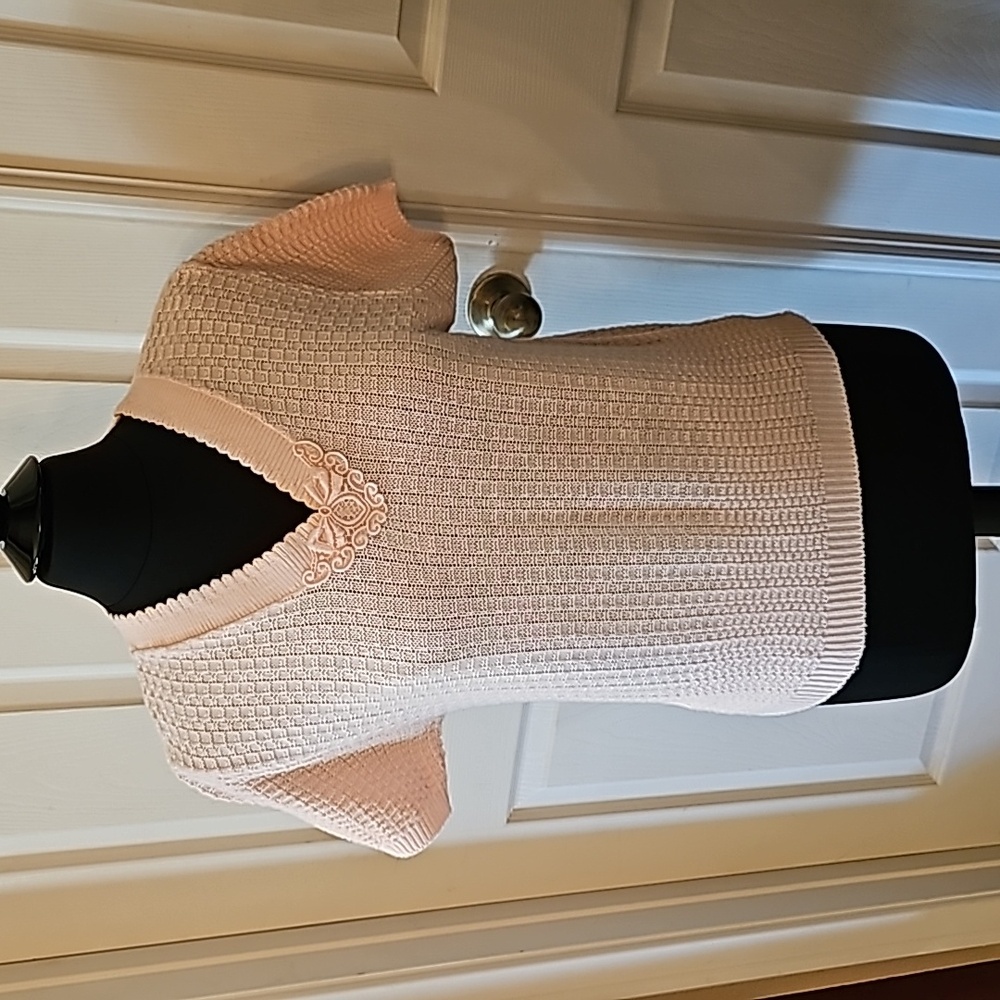 Blair pastel pink sweater.